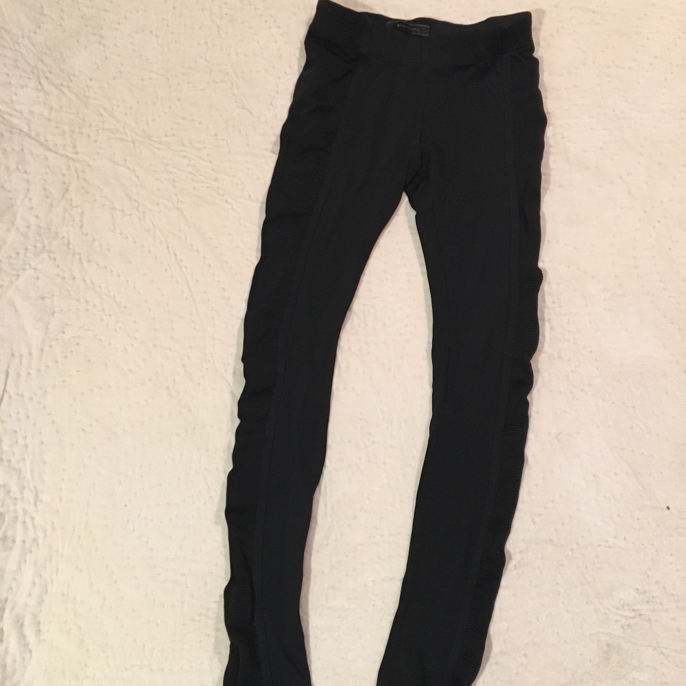 BeBe black leggings with textured side strip!